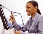 Businesswoman writing on a tablet-like screen