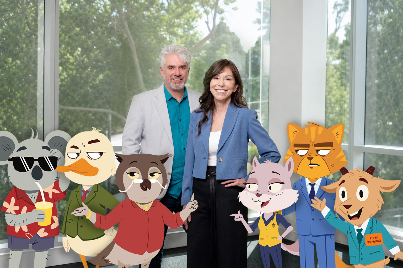 A man with grey hair and beard and a woman with dark brown long hair, surrounded by different animated animals.